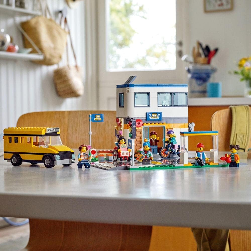 LEGO 60329 City School with School Bus, 2 Classrooms and Street Plates, Adventure Toy for Children from 6 Years, School Day in the City, Gift