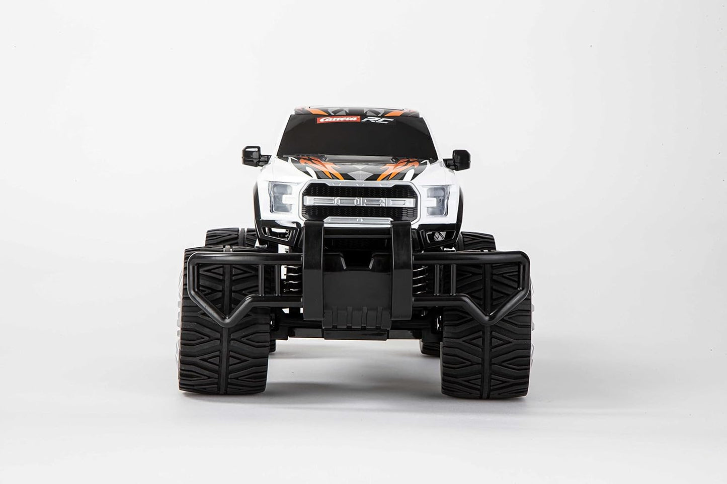 Carrera RC Ford F-150 Raptor I Remote Controlled RC Truck I For Children and Adults from 6 Years I Rechargeable Battery for 40 Minutes of Driving Fun I 18 km/h I For Beginners and Professionals I 2.4