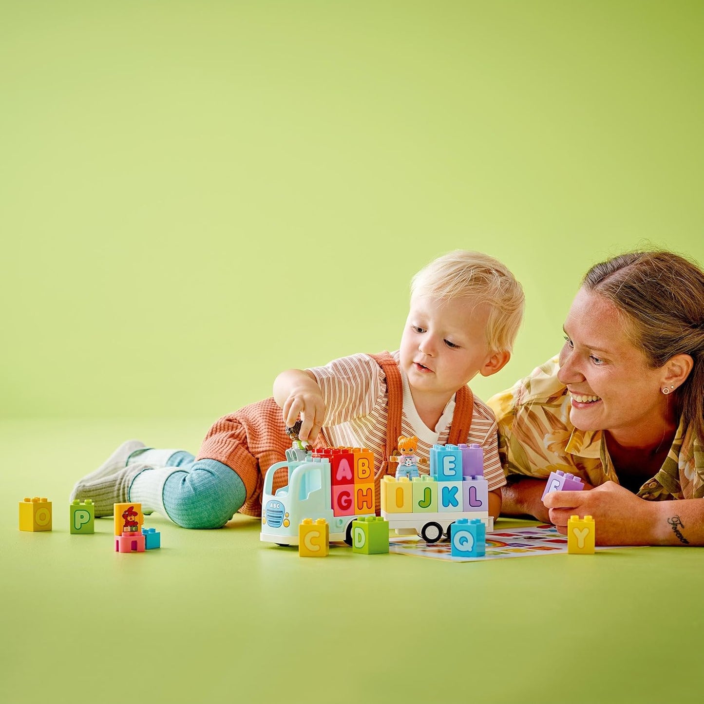 LEGO DUPLO Town Alphabet Truck Toy for Toddlers, Boys & Girls Aged 2 Plus, ABC Learning Vehicle Construction Toys Set with a Trailer Carrying Alphabet Bricks and Boy and Girl Figures 10421